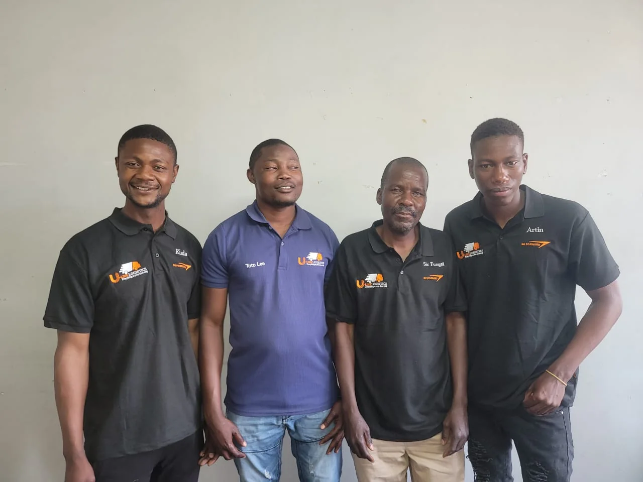 U-Link Logistics team in branded uniforms
